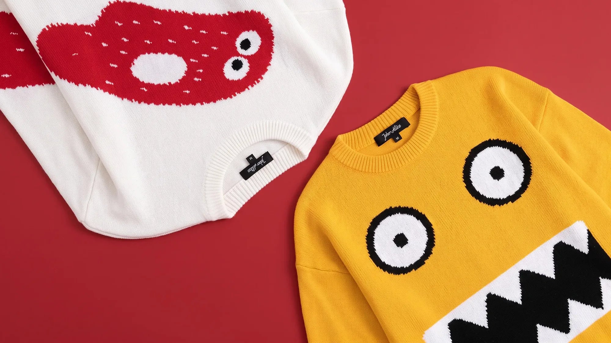 Gaze × Drift paired character jumpers arranged on a red background.
