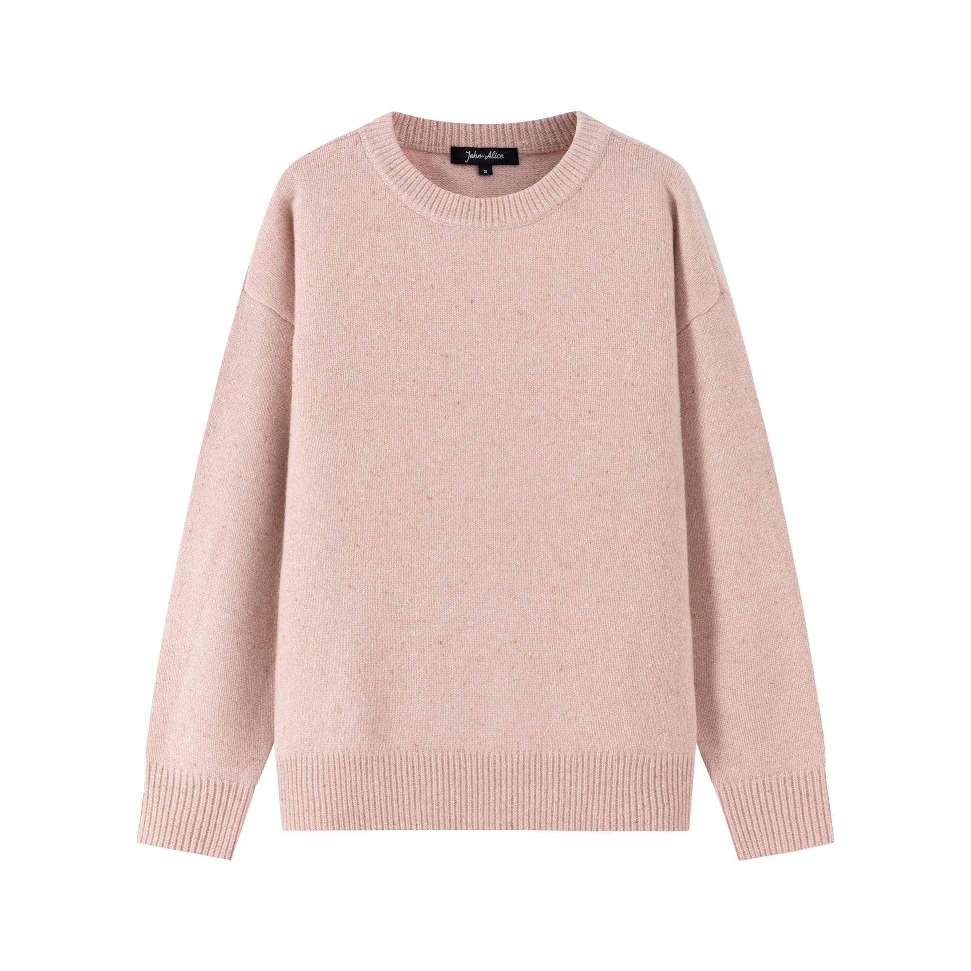 Front view of a blush pink jumper with a crew neck, ribbed trims and a slightly oversized fit.