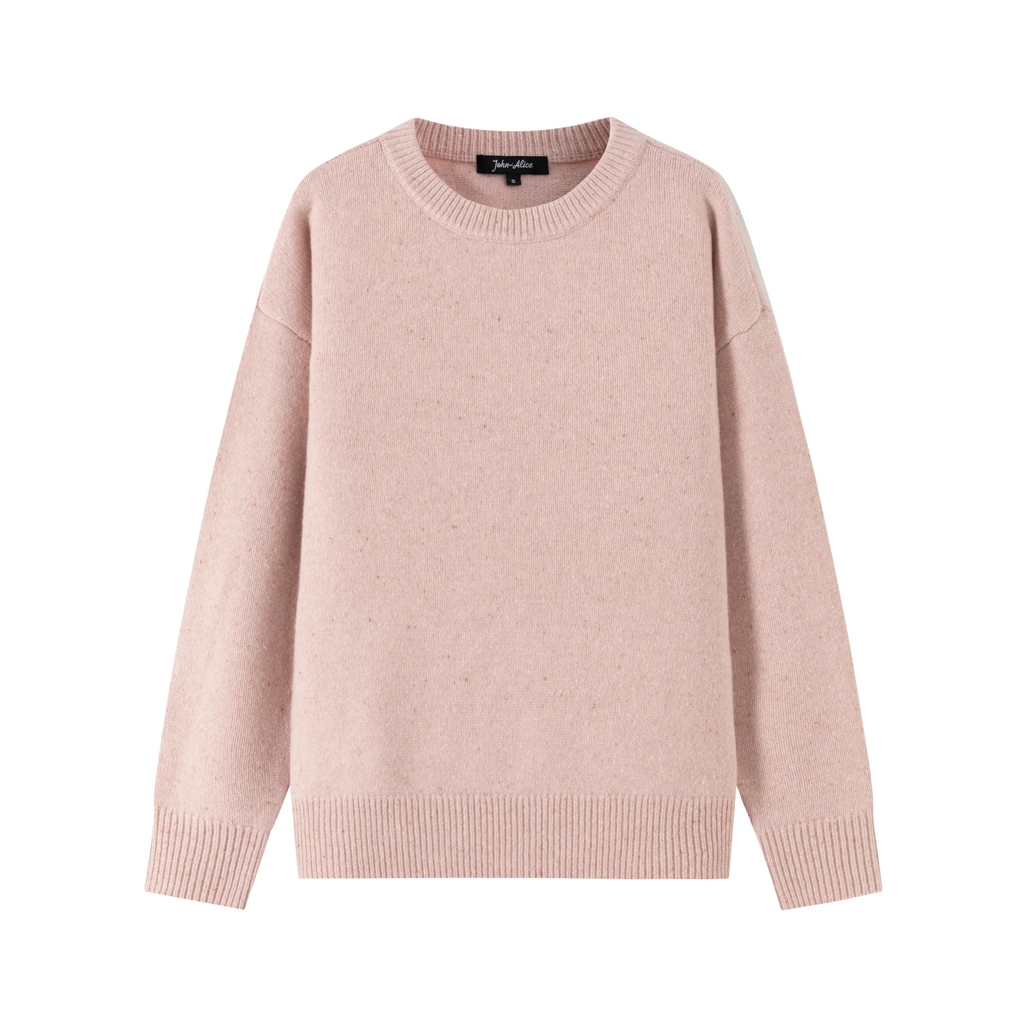 Front view of a blush pink jumper with a crew neck, ribbed trims and a slightly oversized fit.