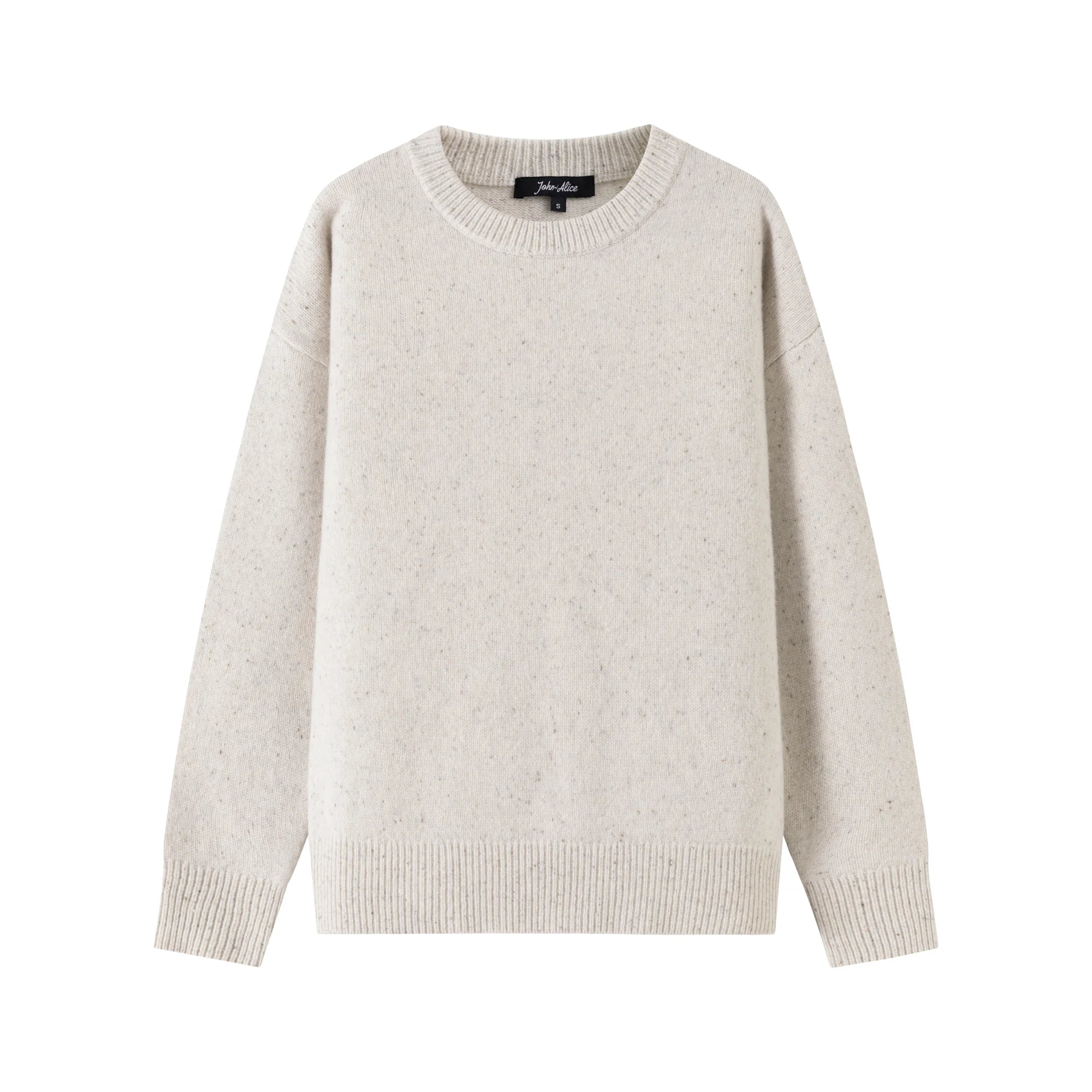 Front view of an oatmeal jumper with a crew neck, ribbed trims and a slightly oversized fit.