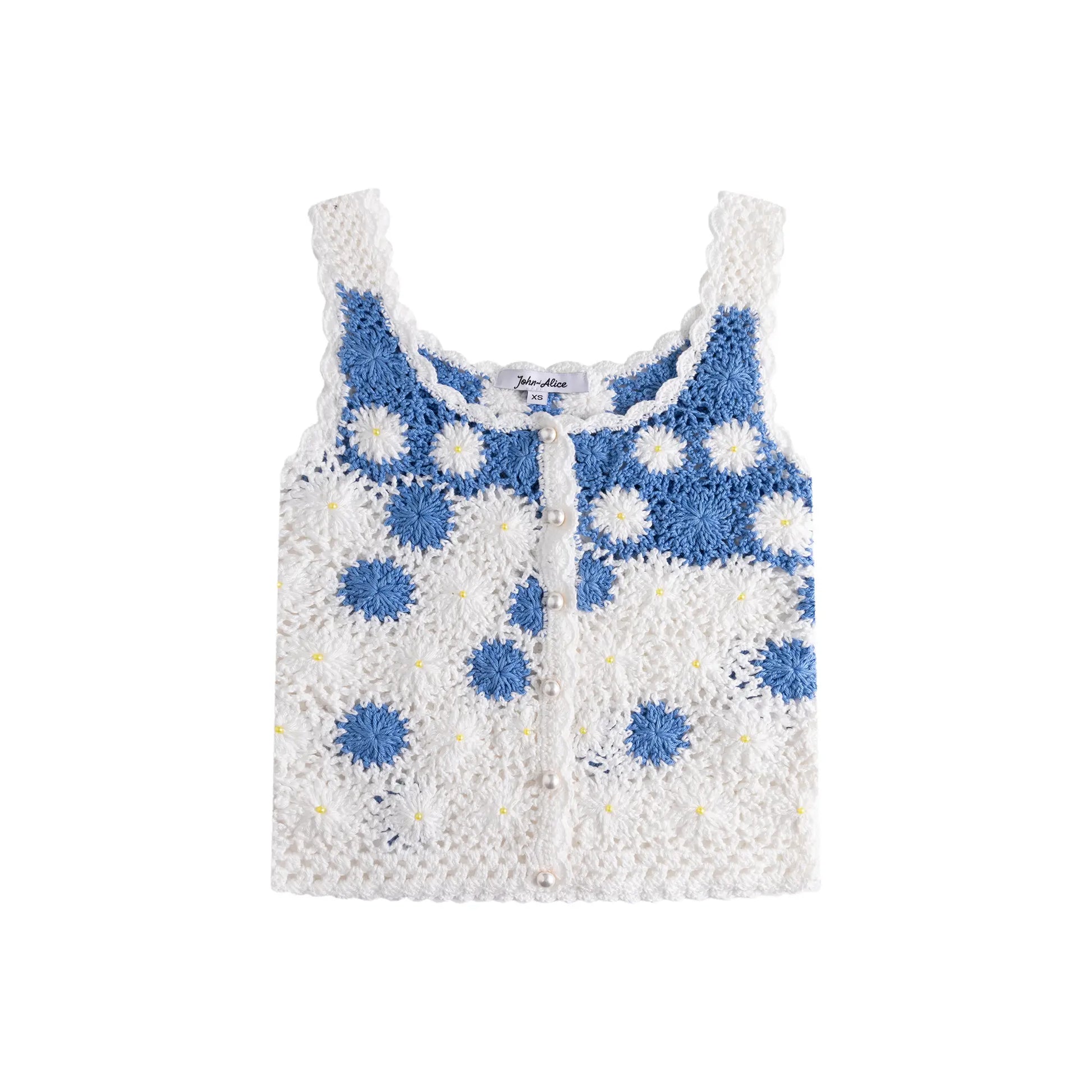 Front flat view of a hand-crocheted fitted top in white with blue floral motifs and small bead details.