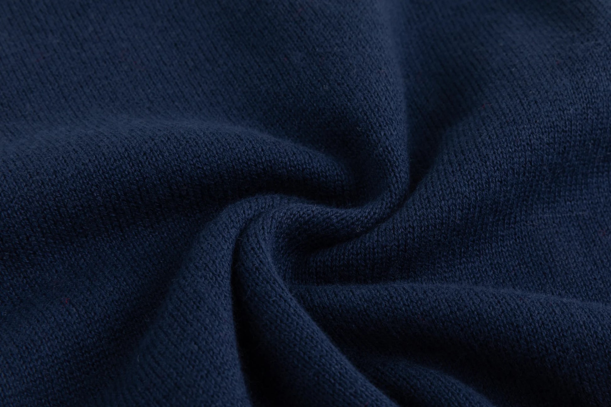 Close-up of the knit texture on the navy tank.