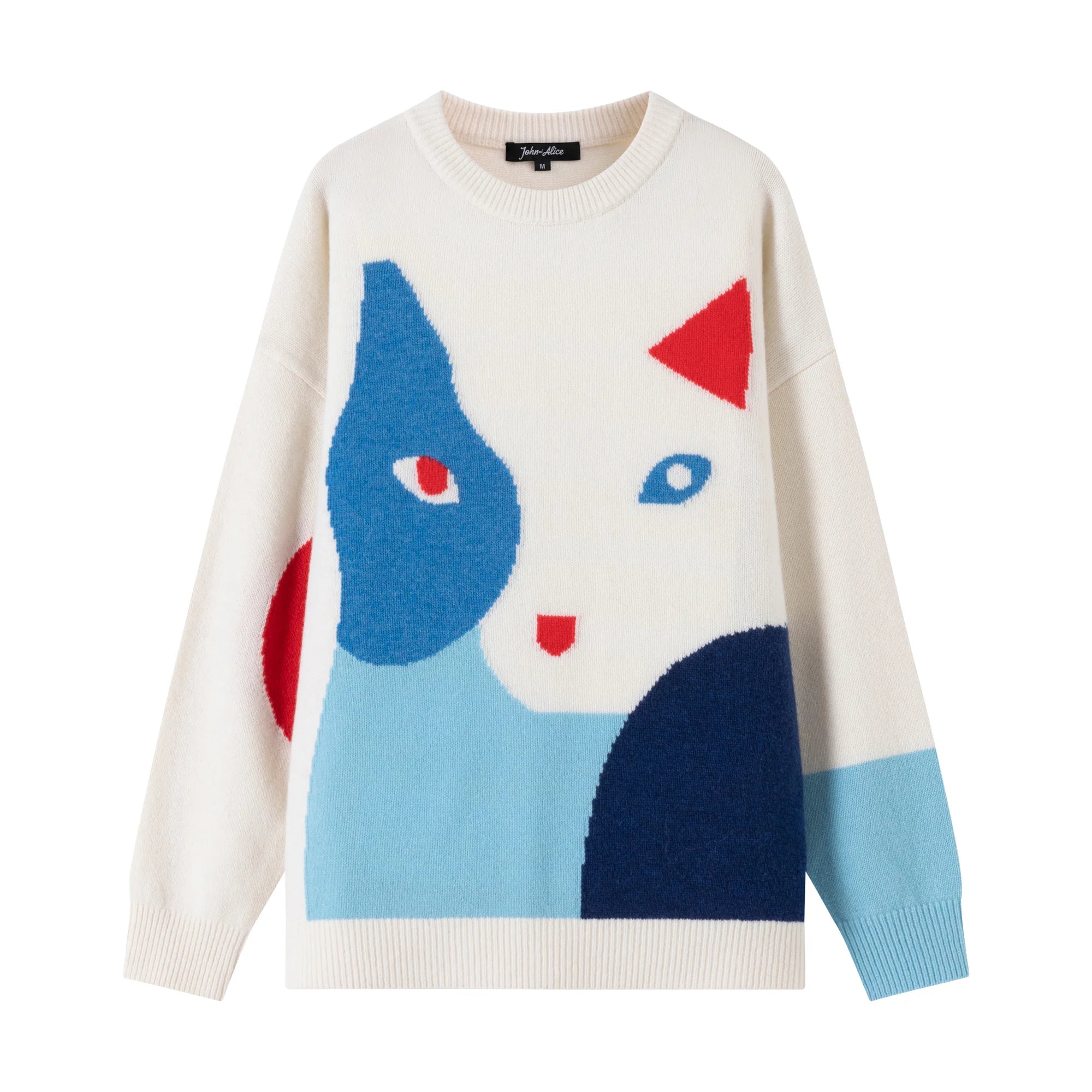 Front flat view of a cream merino wool jumper with a contrasting abstract cat intarsia and a dropped-shoulder silhouette.