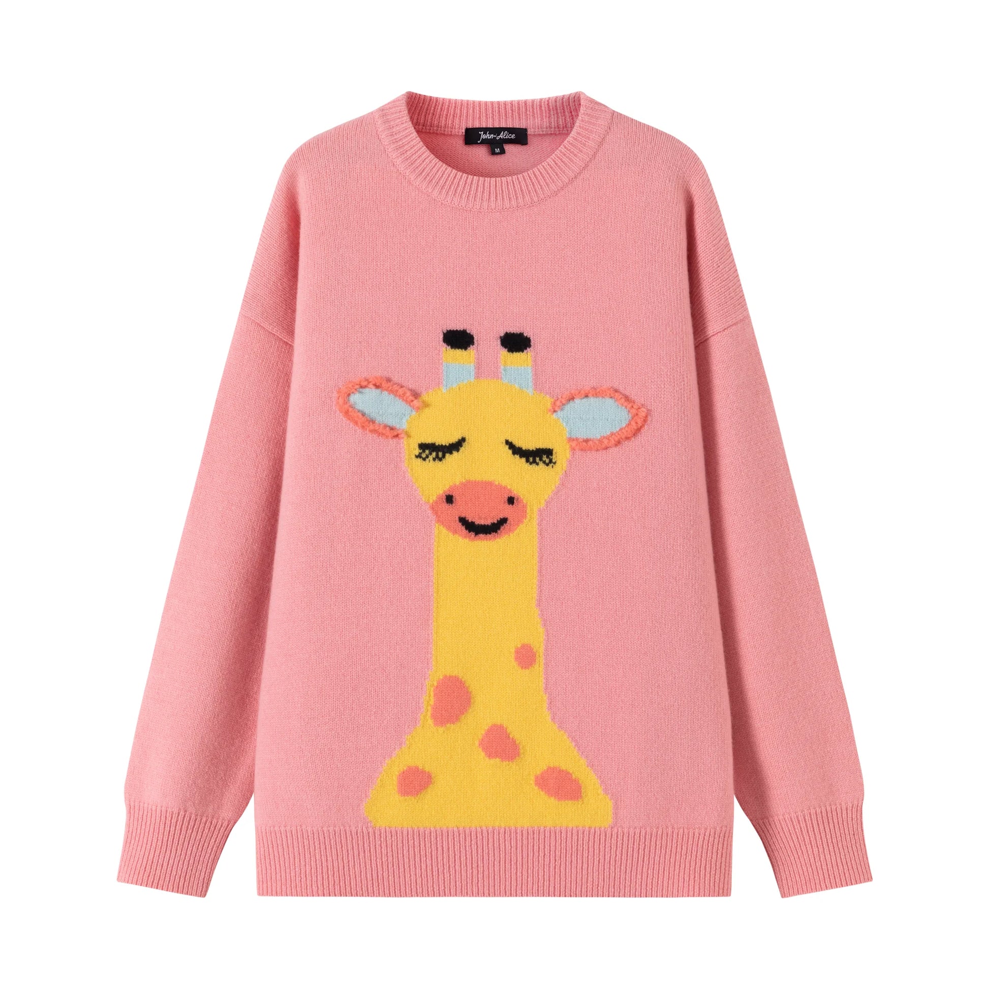 Front flat view of a pink merino wool jumper with a giraffe intarsia on the front.